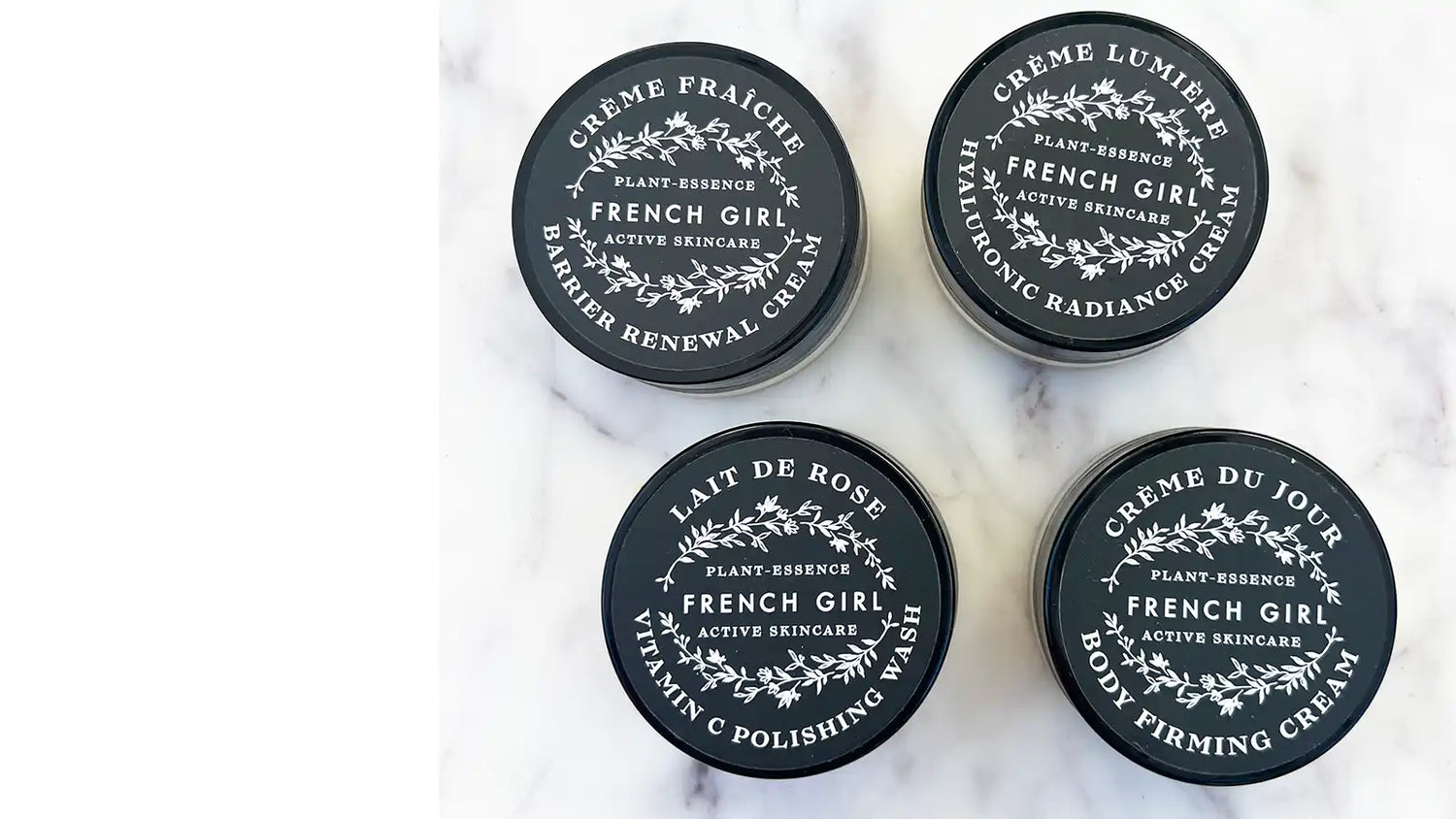 Four black jars of French Girl skincare products.